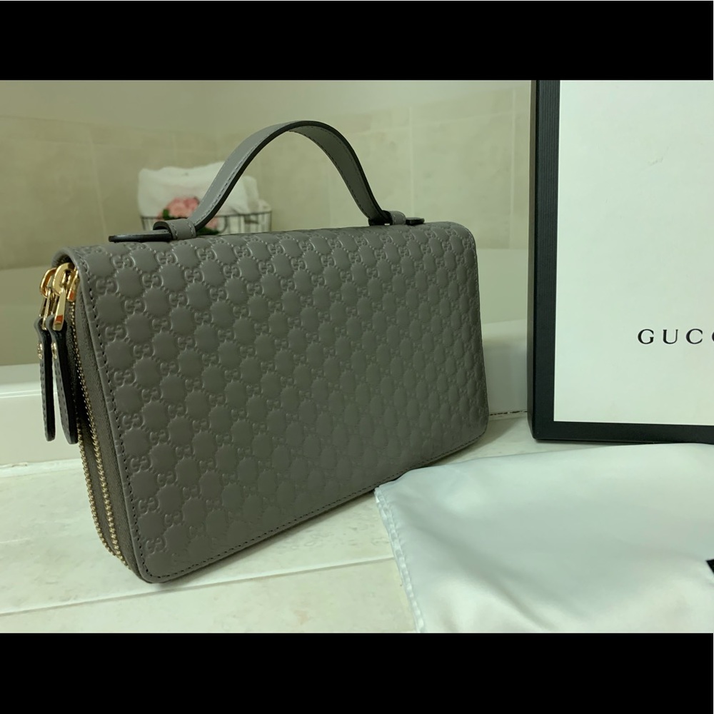 - SOLD - NWT Auth GUCCI Leather Travel double Zip Wallet